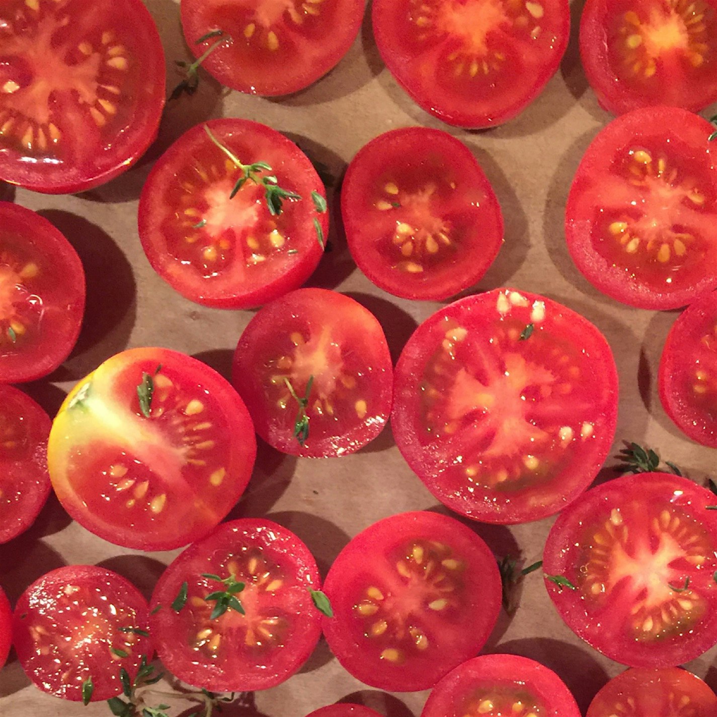 One of my favorite ways to taste summer year-round is by slow roasting and preserving tomatoes. C...