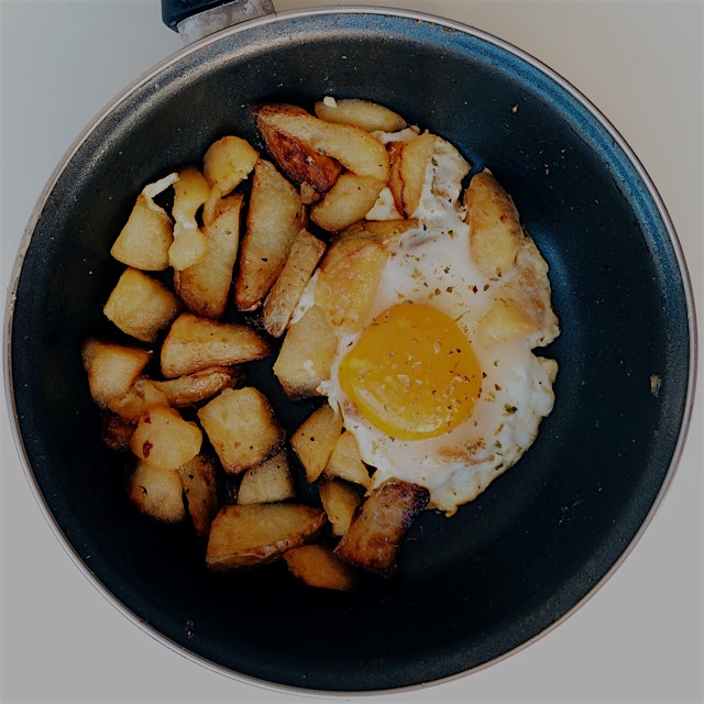 An experiment: just a fried egg over a bed of potato and apple. Yum! 