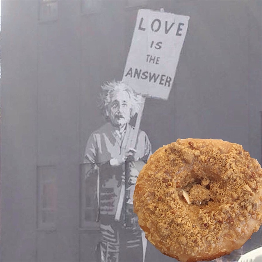 Munching on Cafe au Lait dough doughnuts on the High Line nyc 