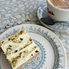 Today's afternoon tea situation: Orange & pistachio slice with a great New Zealand flat white. 