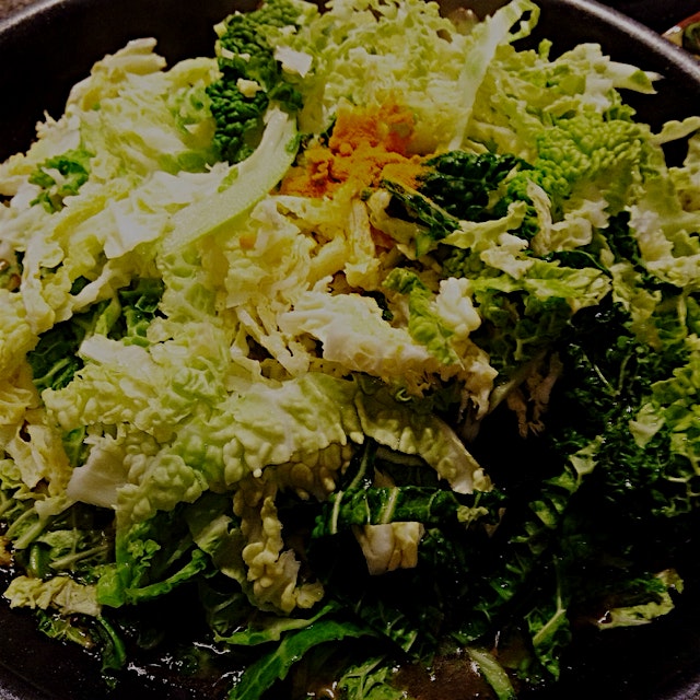 Savoy cabbage in my sauté pan. Cooked the way my mum always did most leafy veggies - with fenugre...