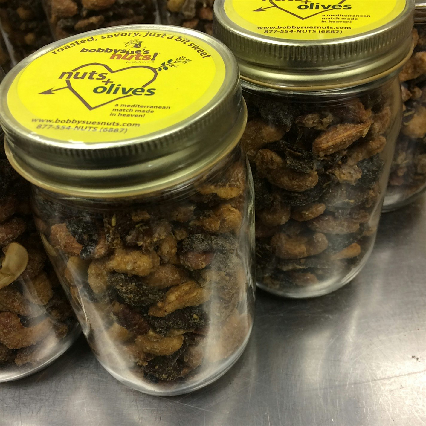 bobbysue's nuts! new flavor Nuts + Olives now available in all Whole Foods!!!  Give them a try :) 